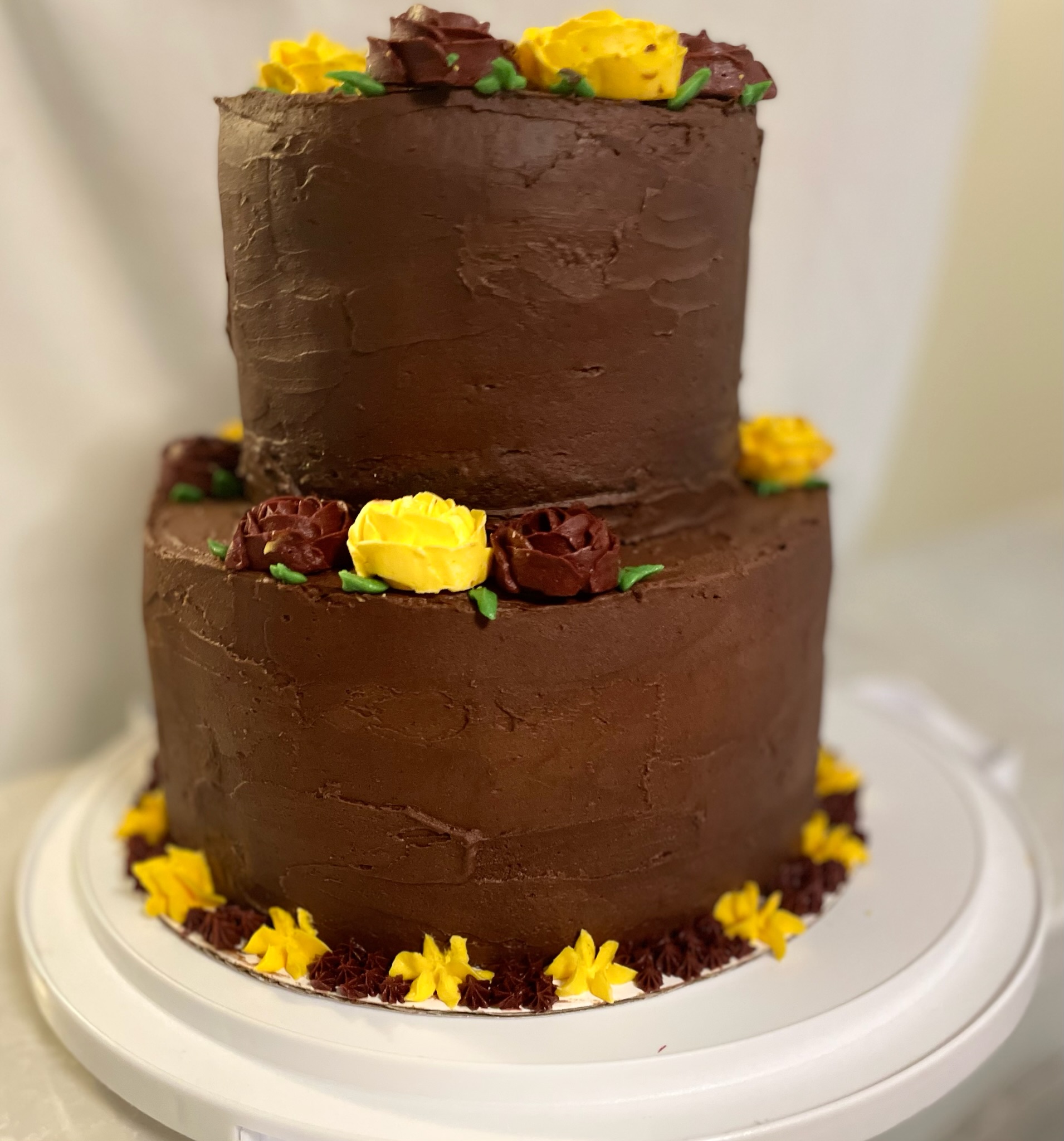 A two-tiered chocolate cake.